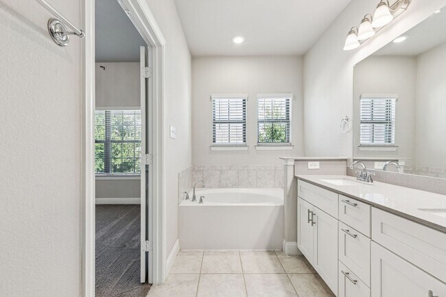 Building Photo - Discover Elevated Living at Normandy Village