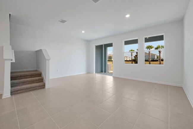 Building Photo - Beautiful New 3-Bedroom Townhome in Davenport — Includes Resort Pool, Modern Clubhouse & Family P...