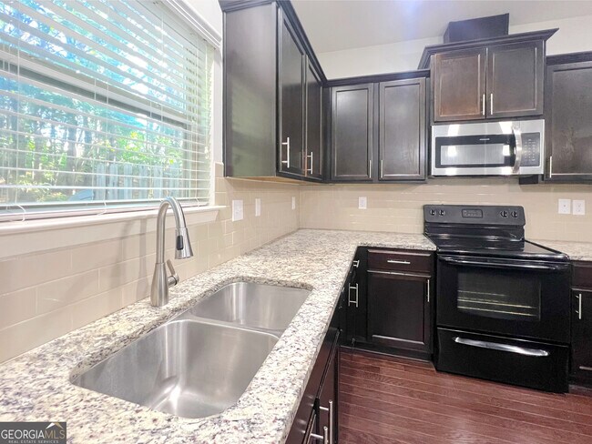 Building Photo - 6173 Roaring Rock Wy