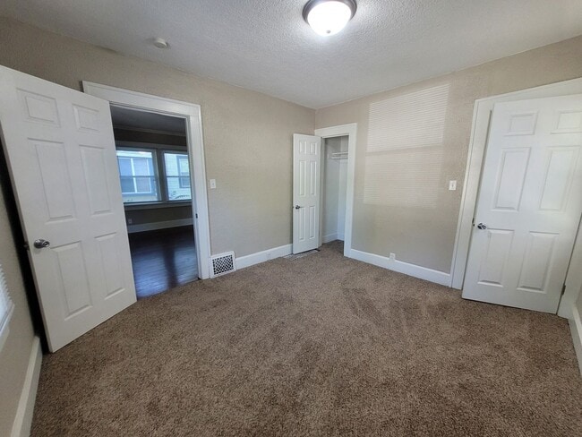 Building Photo - Two bedroom, One Bathroom Home with Partially fenced back yard