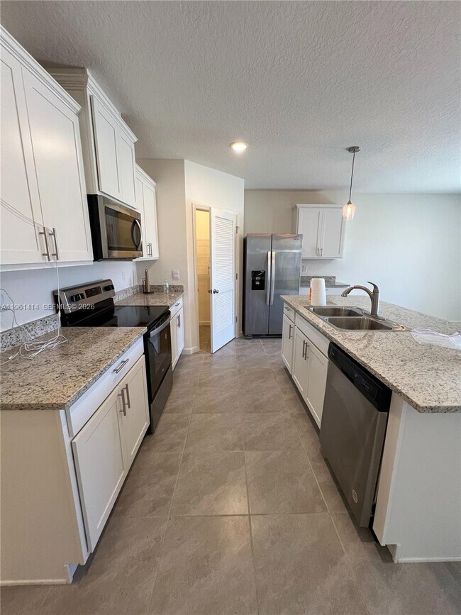 Building Photo - 7144 Topaz Dr