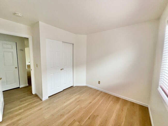 Building Photo - Welcome to this charming single-story home...