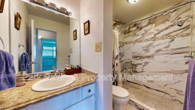 Building Photo - 555 E 10th Ave