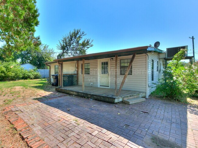 Building Photo - 9706 N Garnett Dr