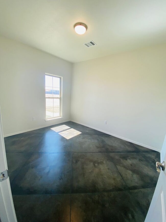Building Photo - Stunning New 3/2 Townhomes
