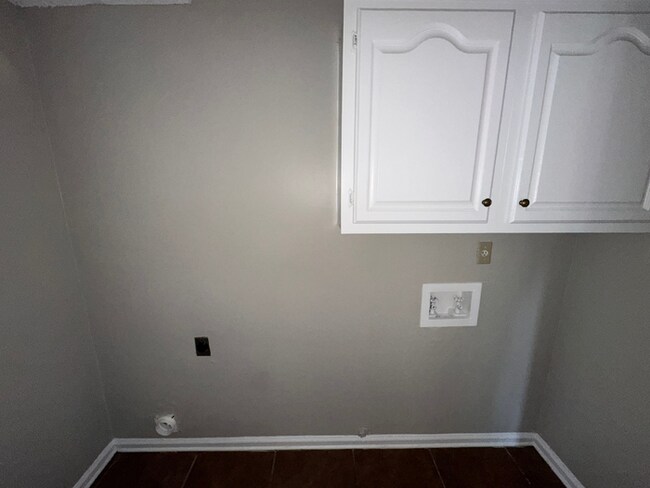 Building Photo - Grand 4BR/2BA Near Southwind | 2,438 Sq Ft, Stone Fireplace, Soaking Tub & 2-Car Garage