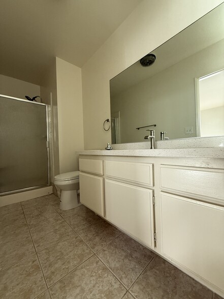 Attached bathroom in bedroom 2 - 11908 Riverside Dr