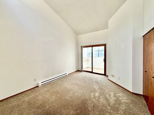 Building Photo - Spacious 2-Story Condo in Crossroads Commu...