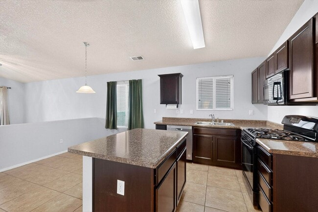 Building Photo - Montano Unser NW 3/4 bedroom 2/bath 2/Car garage