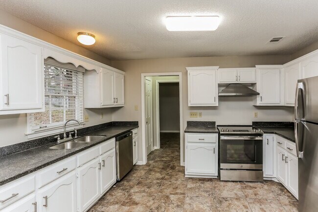 Building Photo - 8828 Chimneyrock Blvd.