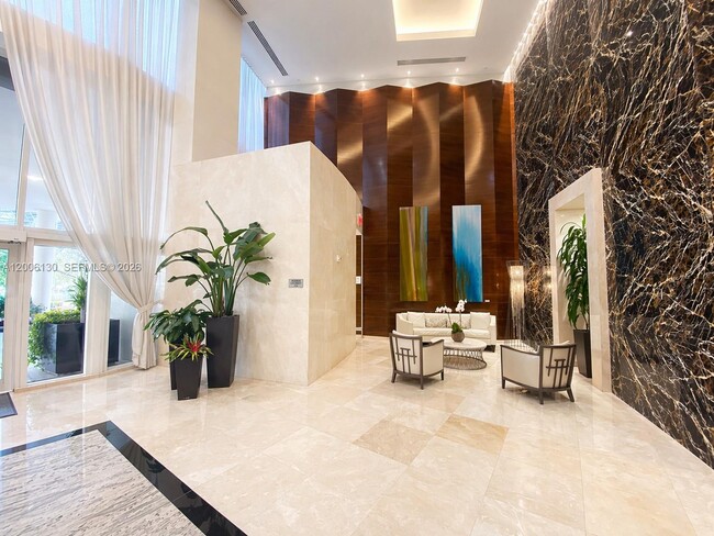 Building Photo - 15811 Collins Ave