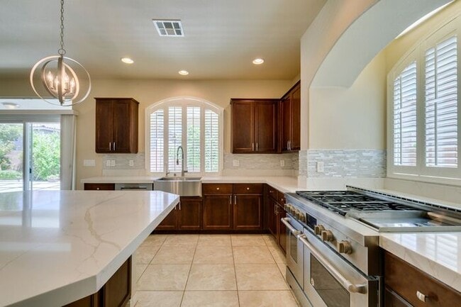 Building Photo - Bright & Spacious 5-Bedroom Home with 3-Car Garage in 89141