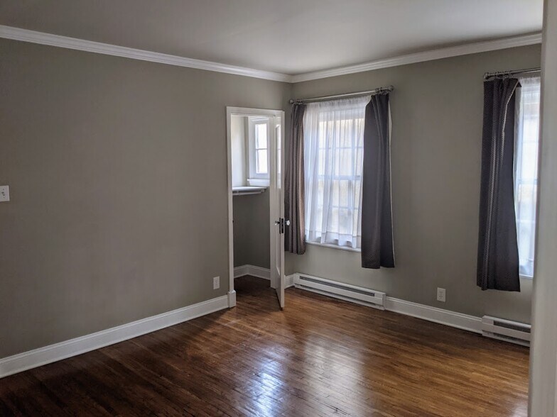 Bedroom 2 today. (Both bedrooms have electric floor radiators, so you can not heat the whole house.) - 1327 S Sycamore Ave