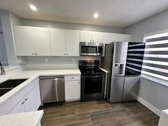 Building Photo - 14307 SW 120th Ct