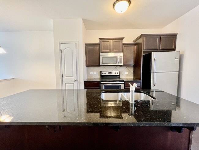 Building Photo - 12712 Persimmon Tree Dr