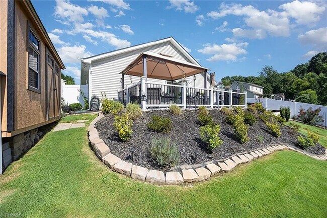 Building Photo - Earn Wealth While Leasing - Like a Homeown...