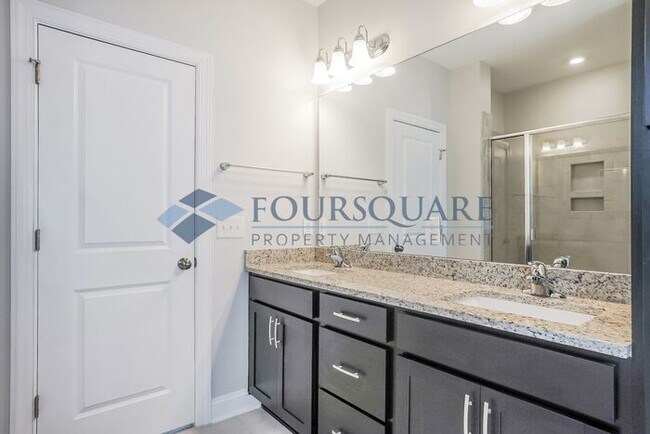 Building Photo - Spacious  End-Unit Townhome | Rear Deck & 2-Car Garage  | Near Brier Creek