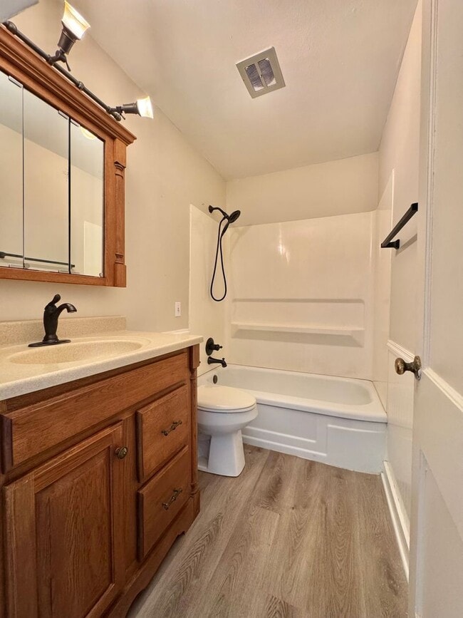 Building Photo - NOW AVAILABLE - 4 Bedroom + 3 Bathroom Hom...