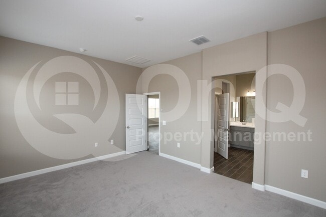 Building Photo - 40774 W Sunland Dr