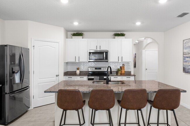 Building Photo - 4BR Under $2,300/mo | Tesla Charger | 15 Min to Lake Nona