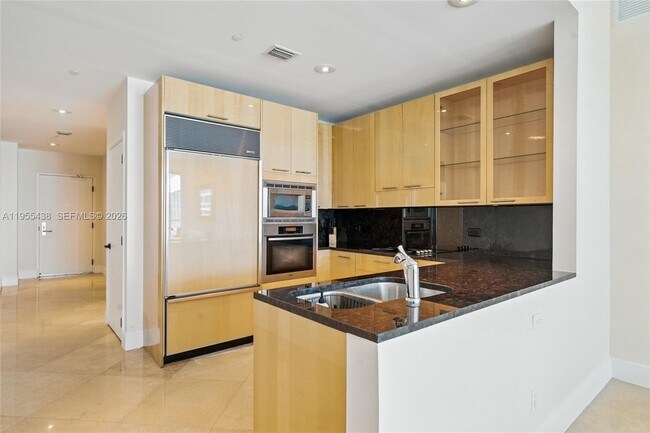 Building Photo - 6799 Collins Ave