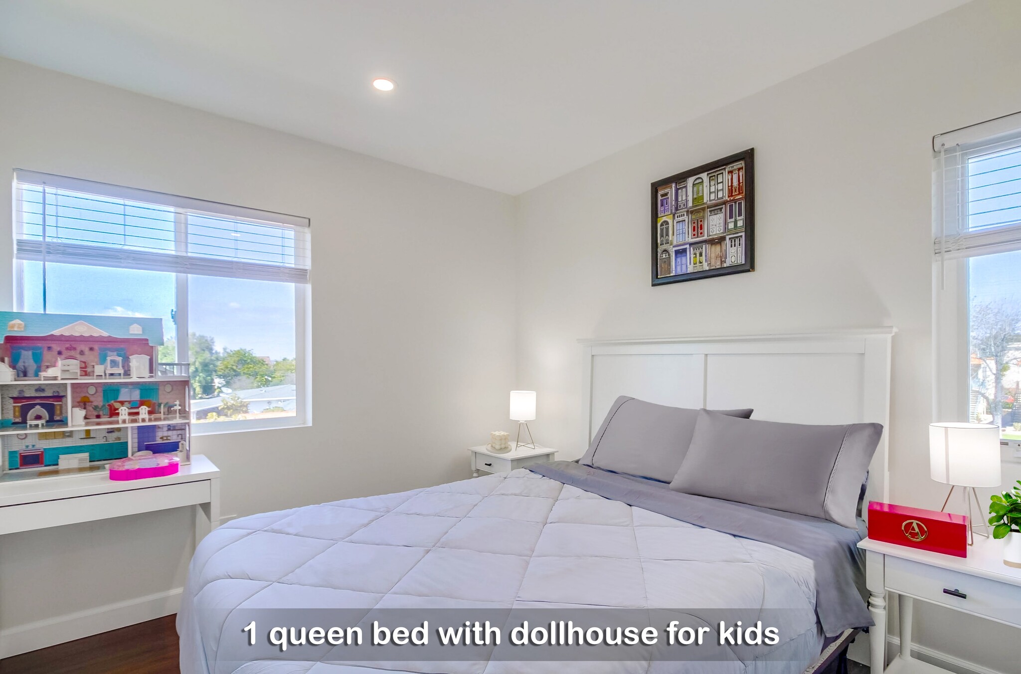 A cozy queen bed invites you to relax and recharge for the day ahead. - 723 E 22nd St