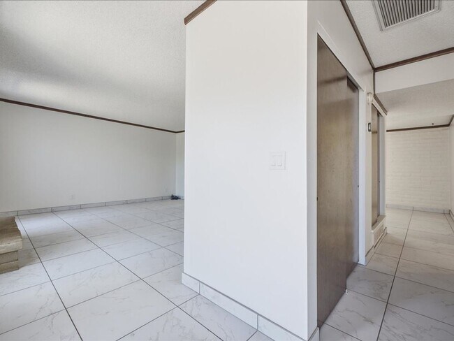 Building Photo - Concept Living with Large Enclosed Backyard & Modern Upgrades!