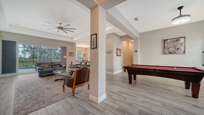 Building Photo - Furnished 4-Bedroom Home with Pool in The Sought After Neighborhood Of Rivo Lakes!!