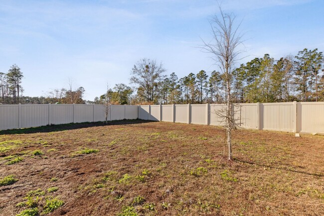 Building Photo - Like New 3 Bedroom With A Fenced Yard