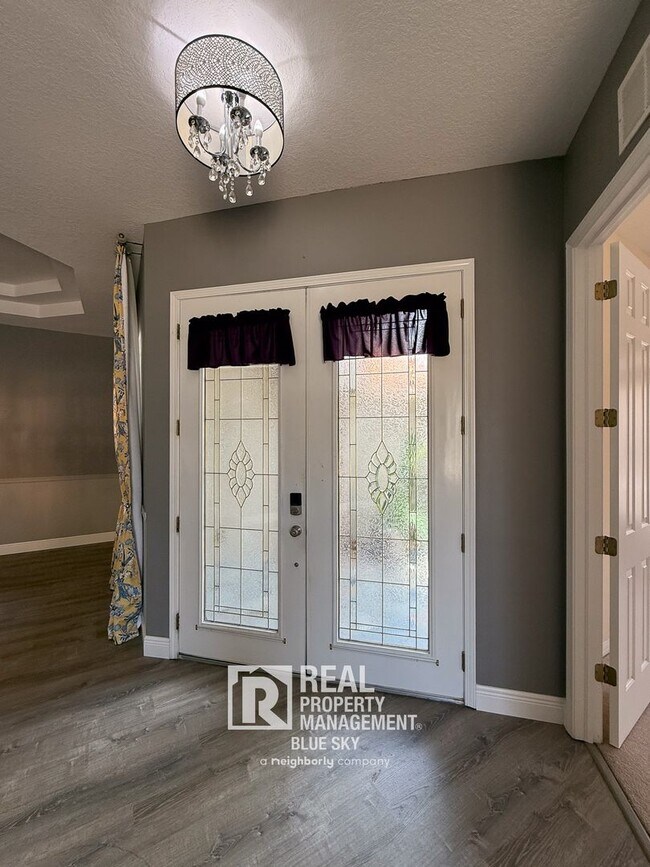 Building Photo - Executive Home with Custom Finishes in Gat...