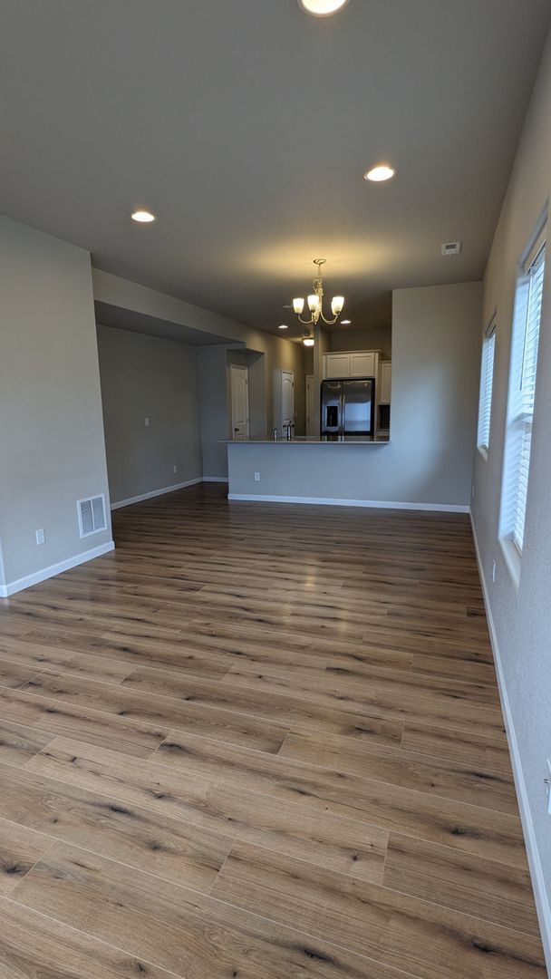 Building Photo - NEWER END UNIT TWO STORY TOWNHOME WITH A/C...