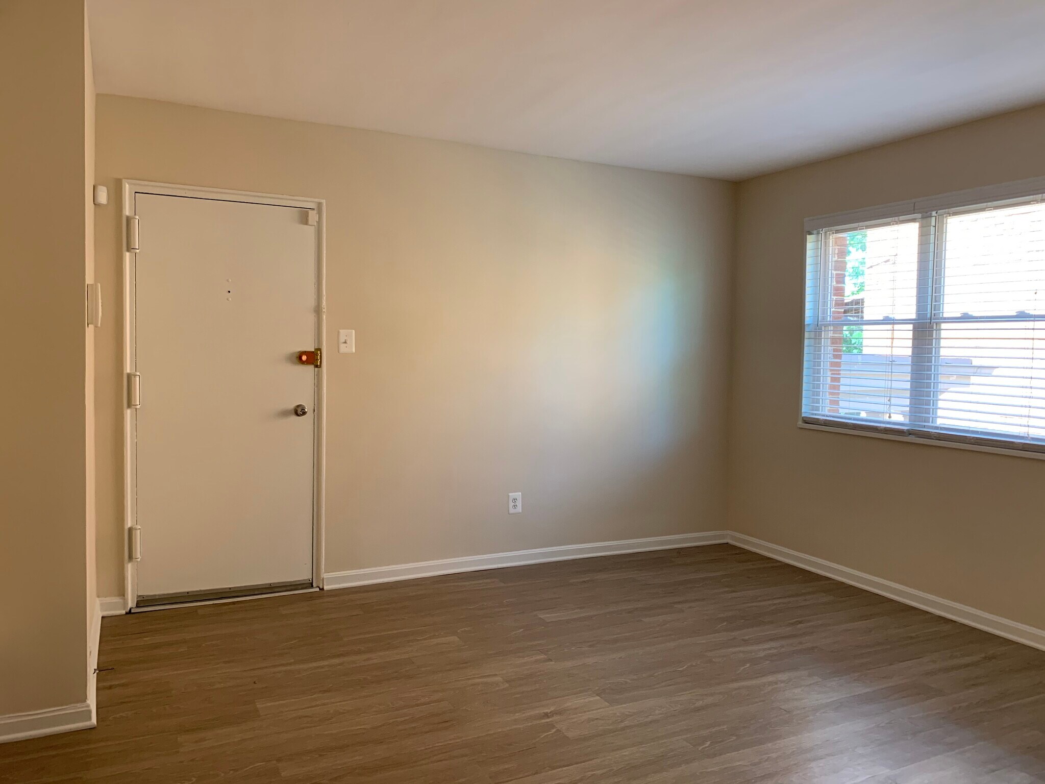 Picture showing new floors in the evening. - 526 Kenyon Street NW #101