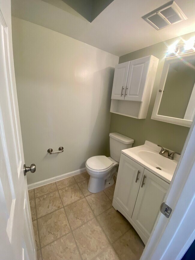 First floor half bath - 424 W Hill St