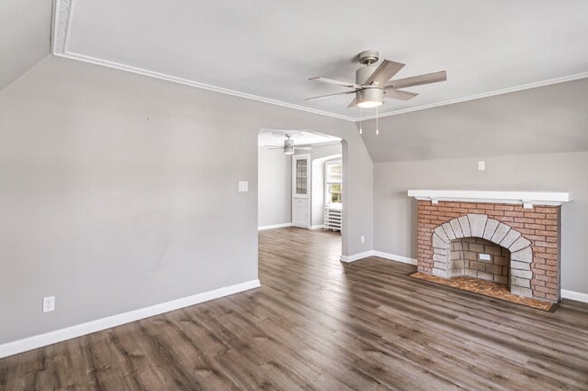 Building Photo - This spacious upper unit features 2 comfortable bedrooms with carpeting