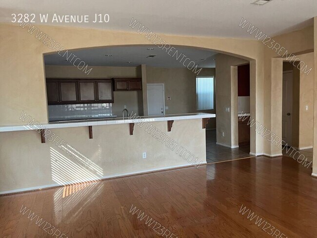 Building Photo - 3282 W Ave J 10