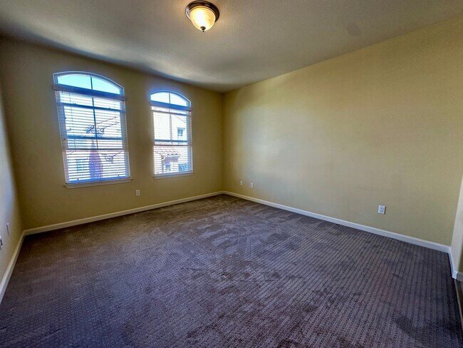 Building Photo - TOWNHOME WITH THOUGHTFUL UPGRADES | CALM SETTING