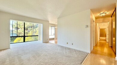 Building Photo - Top-floor with Storage Room & Huge Walk-In...