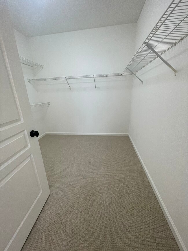 Extra large primary bedroom walk-in closet - 1 Crescent Way