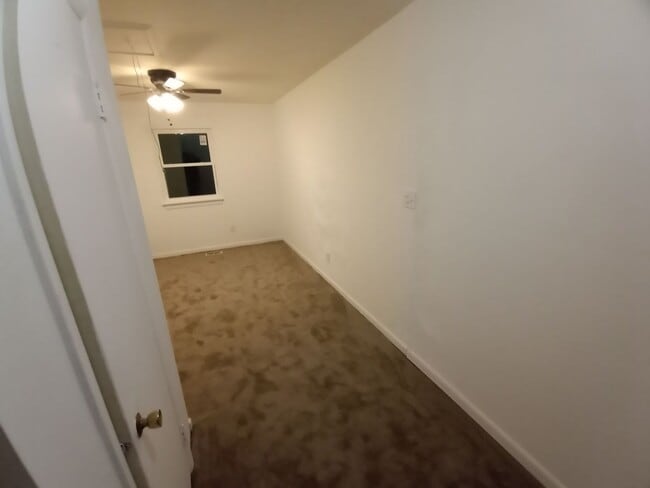 Building Photo - Three bedroom two and one half bath end unit townhome