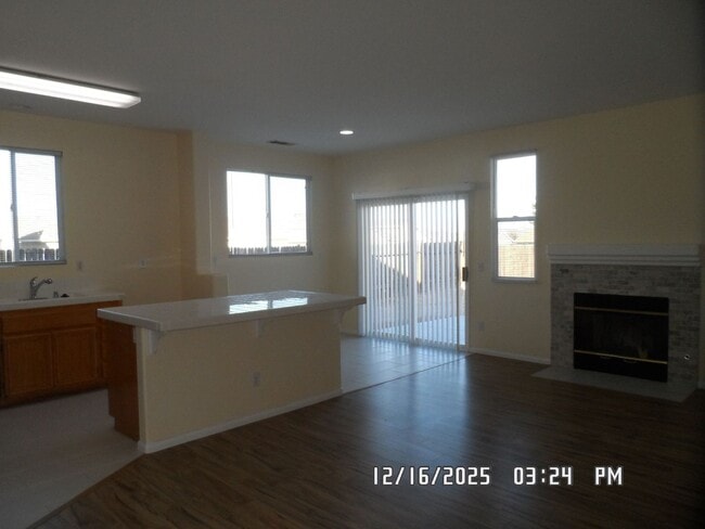 Building Photo - 4 Bedrooms, 2 Bathrooms, 3 Car Garage, 1899 sq. ft., Large Fenced, Front Yard Lawn, Near Schools ...