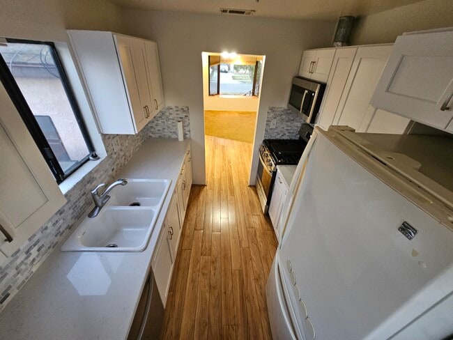 New kitchen torwards living room - 22909 Broadwell Ave