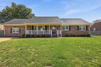 Building Photo - Stunning 4-Bedroom Waterfront Retreat with Modern Upgrades & Lake Living.