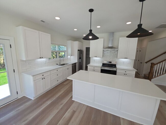 Building Photo - Brand-New 3-Bedroom Home with 2-Car Garage and Maintenance-Free Living
