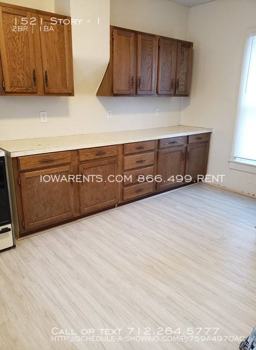 Building Photo - 1521 Story-1