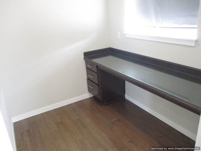 Building Photo - Spacious 4-Bedroom Home with Modern Comforts