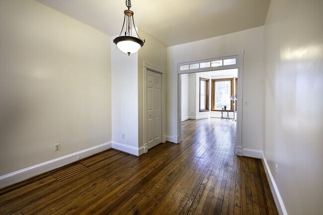 Building Photo - Historic & Charming 3BR Rowhouse near Howard is Move-in Ready!
