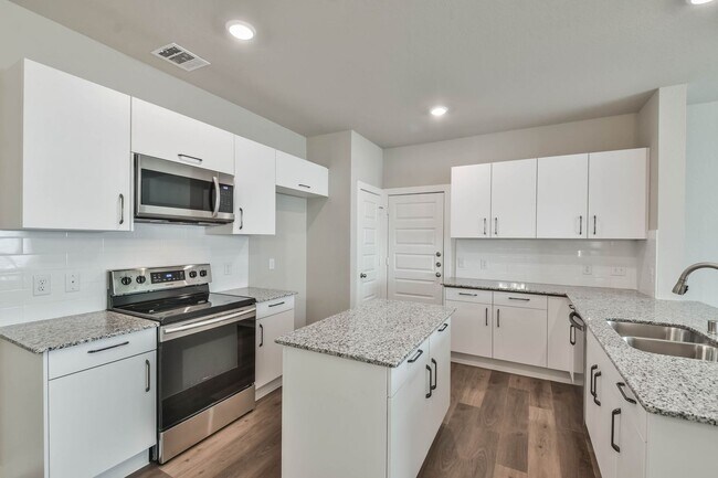 Building Photo - High Ceilings, Low Maintenance -Say Hello ...