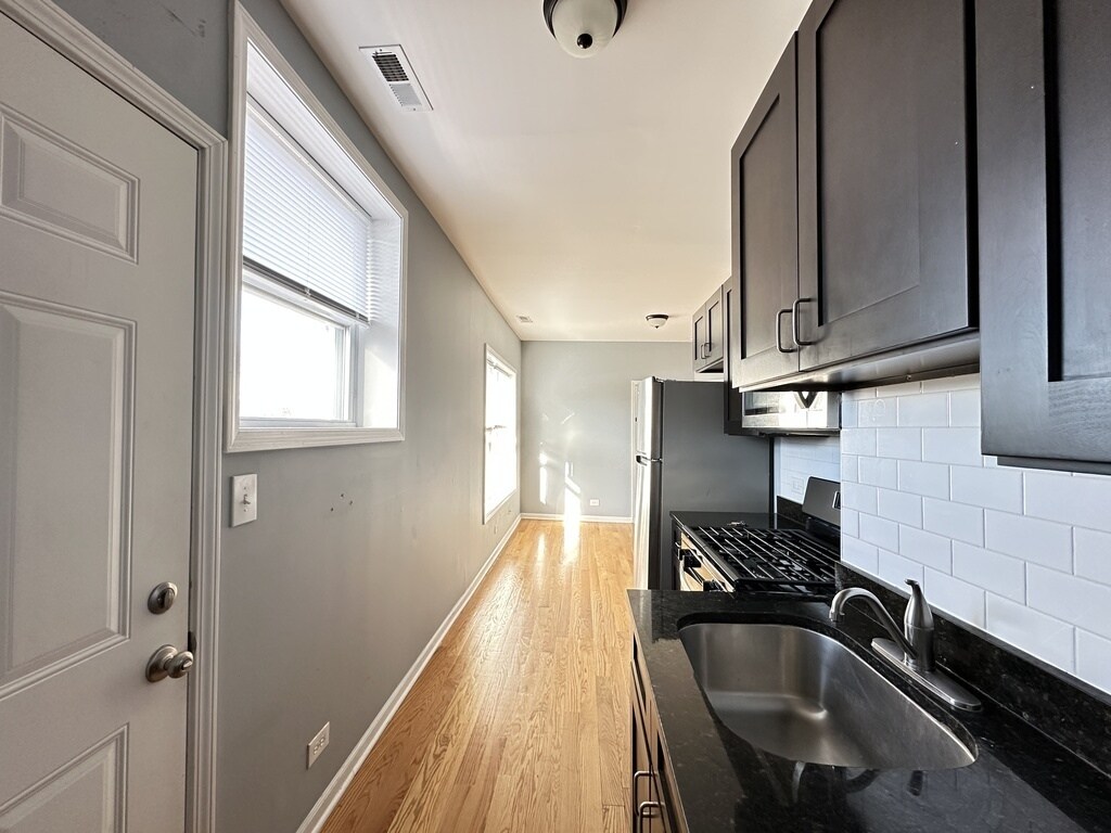 Building Photo - 1648 W Pratt Blvd