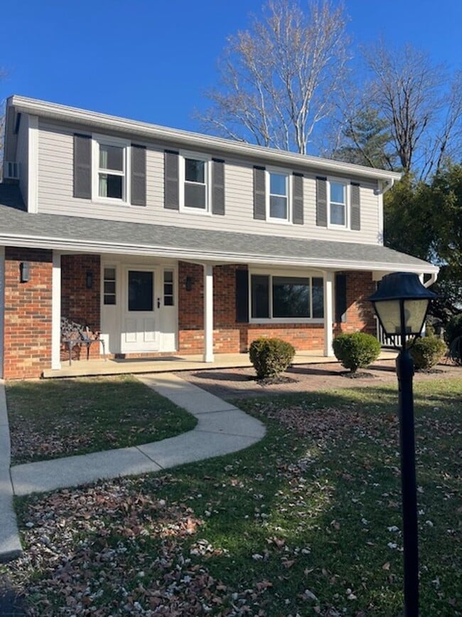 Building Photo - Spacious, Fully Updated Home with Walkout Basement on a Mature Lot