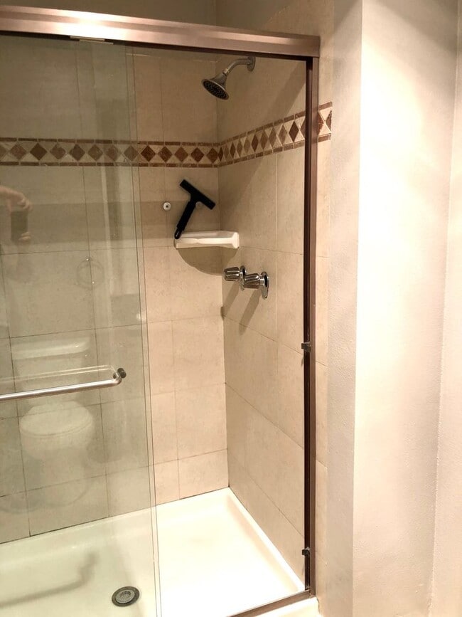 Building Photo - REMODELED CONDO WITH WOOD FLOORS! NEW KITCHEN! FIREPLACE! GYM, POOL! REC ROOM AND MORE